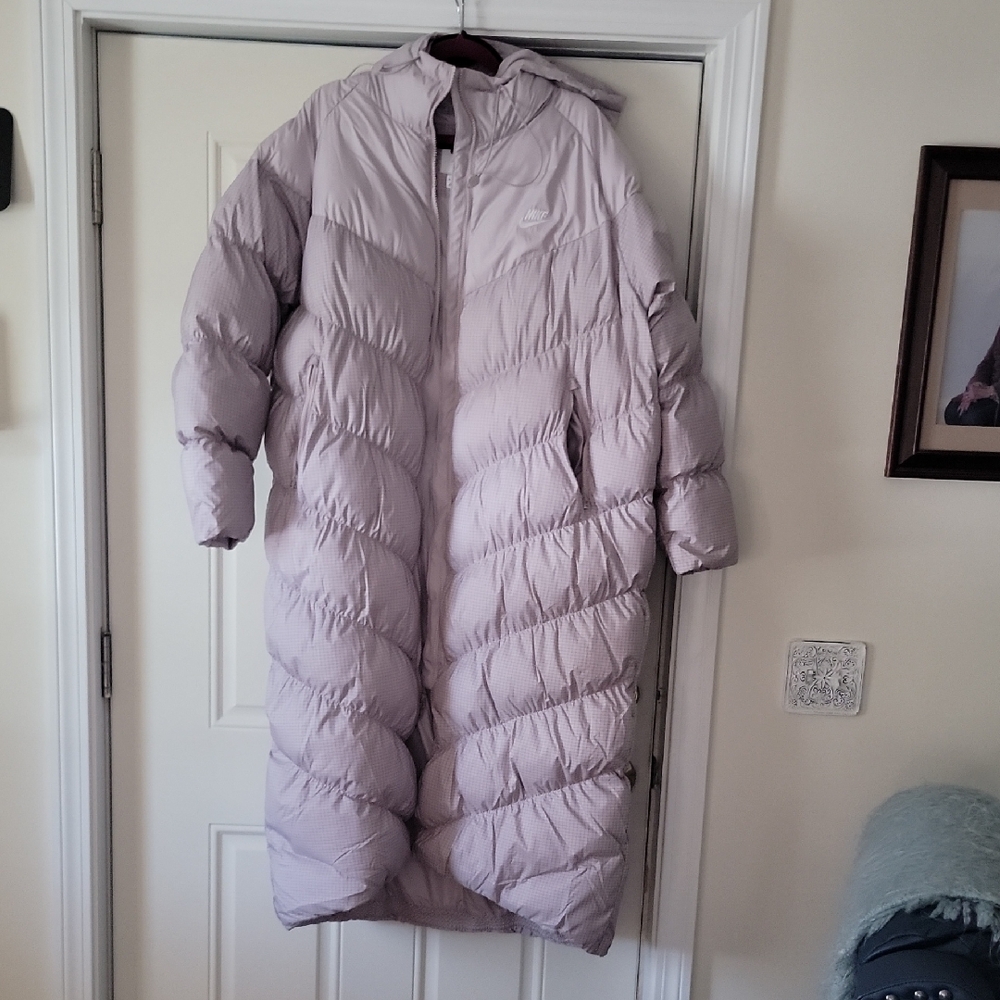 Nike Long Puffer Coat in Light Purple almost a lavender.